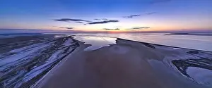 Unusual islands on a brilliant lake, top view, drone camera