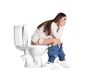 Suffer Prints: Upset woman sitting on toilet bowl, white background