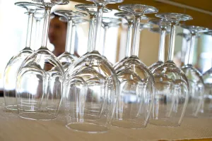 Incidental Prints: Upside down wine glasses in a restaurant