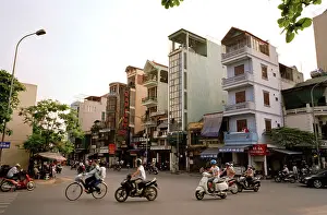 Junction Prints: Urban traffic and street life in Hanoi in Vietnam in Far East Southeast Asia