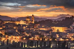Urbino, Italy medieval walled city in the Marche region at twilight