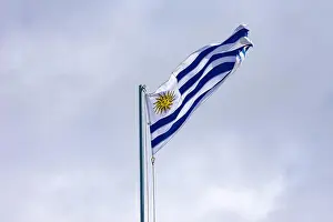 Uruguay Prints: Uruguay flag waving in the sky