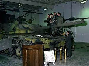 Kentucky Prints: A U.S. Army officer discusses the M-1 Abrams main battle tank with Peruvian dignitaries visiting the U