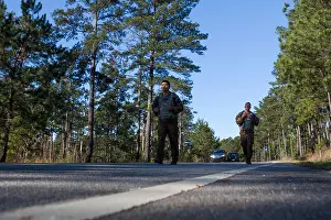 Proficiency Prints: U.S. Army Rangers from the 3rd Infantry Division compete in the Body Armor run segment of the 34th Best Ranger