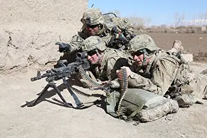 Advance Prints: U.S. Army Sgt. 1st Class Anthony Saldivar (left)