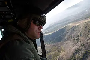 U.S. Marine Staff Sgt. Ryan Deming, a weapons and tactics instructor with Marine Light Attack Helicopter Squadron 775, Marine Aircraft Group 41