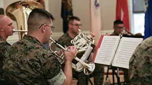 Sergeant Major Prints: U.S. Marines with the 2d Marine Aircraft Wing Band play the Marine Corps Hymn at a relief