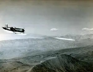 Corsair Prints: U.S. Navy Vought F4U Corsair fighter aircraft fires a 6