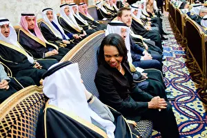 Saudi Arabia Prints: Former U.S. Secretary of State Condoleezza Rice chats with a member of the Saudi Royal Family after welcoming the new