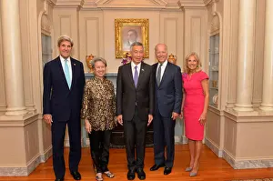 John Kerry Prints: U.S. Secretary of State John Kerry poses for a photo with Mrs