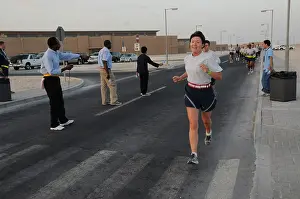 2009 Prints: U.S. service members participate in a 5K run as part of the Great Desert Smokeout Nov