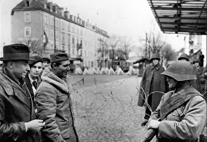 Talks Prints: A U.S soldier talks with a Swiss Guard at St Louis (France) Fall 1944