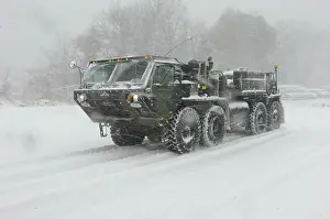 Airforce Prints: U.S. Soldiers ride in a heavy expanded mobility tactical truck as part of the Virginia National Guard's 116th