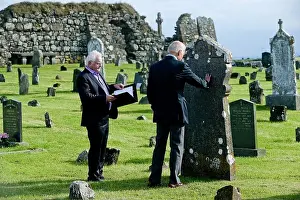 Overseas Prints: U.S. Vice President Joe Biden touches the tombstone of the Finnegan family
