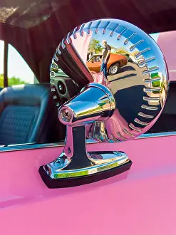 Jaynes Gallery Prints: USA, Arizona, Buckeye. Rear-view mirror on pink classic car
