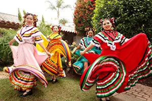 Professionals Prints: USA, California, San Diego, several members of Grupo Folklorico colorfully dance at the Fiesta de Reyes in Old Town