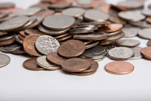 Penny Prints: USA coin money on a white background. Penny, dime, quarter, nickel