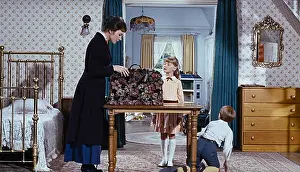 Film Still Prints: USA. Julie Andrews, Karen Dotrice and Matthew Garber in the ©Walt Disney film: Mary Poppins (1964)