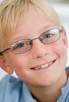 New York State Prints: USA, New York State, Old Westbury, Portrait of blonde boy wearing glasses