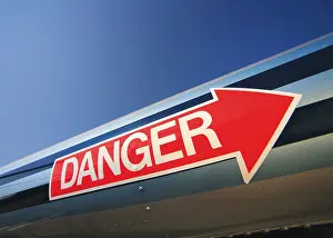 Western Script Prints: USA, Red arrow label showing danger sign