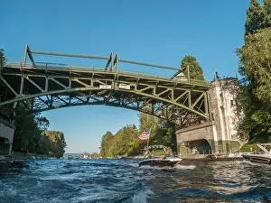 Motorboat Prints: Usa, Washington State, Seattle, boat in Montlake Cut under Montlake Bridge