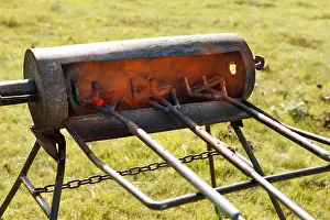 Encampment Prints: USA, Wyoming, Encampment, branding irons heating in the fire, Big Creek Ranch