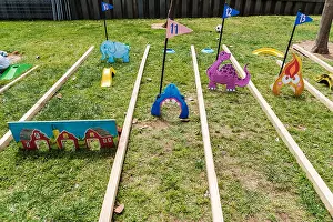 Golfing Prints: Valencia, Spain - April 29, 2019: Portable mini-golf placed on the lawn for children's fun