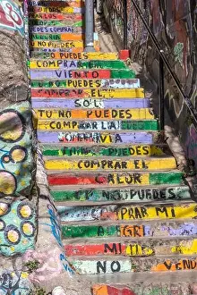 Valparaiso, Chile - Dec 5, 2022: Stairs with graffiti on a steep street of Valparaiso, which has been declared as a World Heritage Site by UNESCO