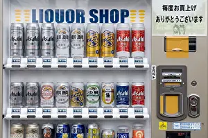 Automated Prints: A variety of Japanese alcoholic beer in cans available to anyone from a coin-operated 'Liquor Shop' beer