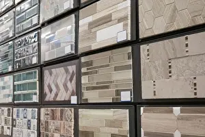 Home Décor Prints: Variety of tile samples displayed in a showroom for interior design inspiration and selection