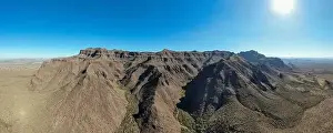 various drone images of the superstition mountains in gold canyon Arizona taken at different times of the day
