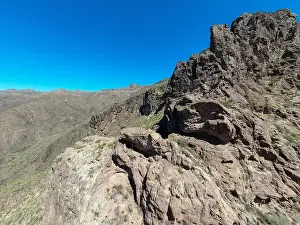various drone images of the superstition mountains in gold canyon Arizona taken at different times of the day