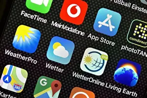 Iphone Prints: Various weather apps on display of an Apple iPhone, Germany
