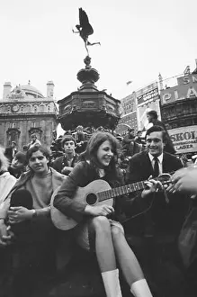 Harrington Prints: Vashti Bunyan playing guitar and singing at Piccadilly Circus, 1966