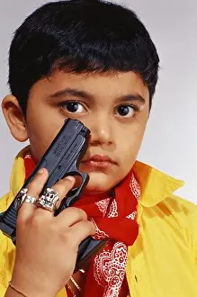Mafia Prints: VDA 63550 : Boy dressed as street rowdy gunda with gun MR#498