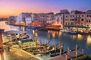 Images Dated 23rd January 2022: Venice, Italy overlooking boats and gondolas in the Grand Canal at dusk