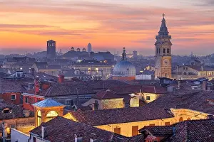 Venice, Italy rooftop skyline and historic landmarks at dusk