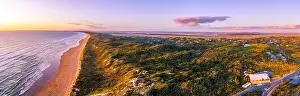 Venus Bay township and coastline at sunset - scenic aerial panorama