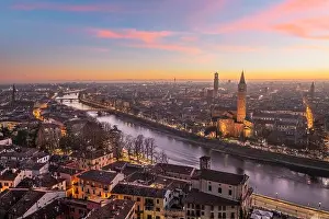 Verona, Italy skyline on the Adige River at dusk