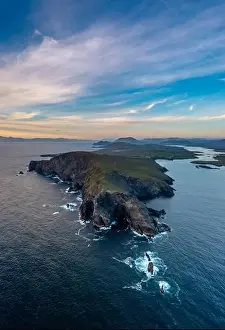A vertical panorama landscape of the Bray Head cliffs on Valentia Island at sunset