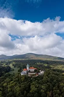 Summer Green Prints: Vertical view of Smolenice Castle in the Little Carpathians in green late summer forest