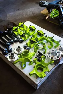 Overhaul Prints: Vibrant performance suspension components are organized for a drift build with freshly painted calipers