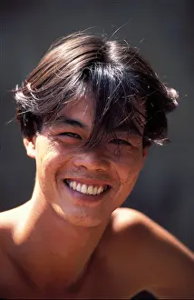 Delta Prints: Vietnam, Hau Giang Province, Mekong Delta, Phung Hiep, portrait of a smiling young man