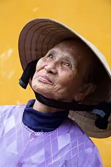 Passenger Prints: Vietnam, Hoi An, portrait of woman with traditional conical hat