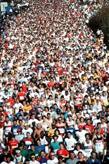 A view of some of the 12, 000 runners participating in the 1988 Marine Corps Marathon at the start of the 26