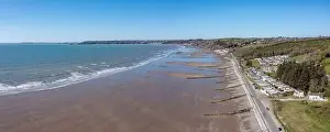 Tides Prints: View of Amroth Beach on the Pembrokeshire coast in winter with very few people