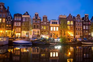 Travel Europe Prints: View of the Amsterdam canals and embankments along them at night