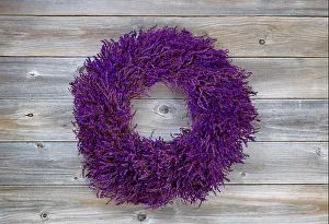 Scent Prints: Top view angled shot of seasonal wreath made of lavender on rustic cedar wooden boards