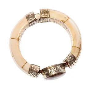 Polished Prints: top view of antique arabic camel bone bracelet with natural stone insert isolated on white background