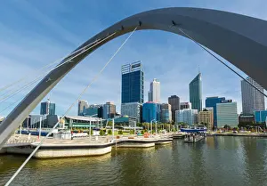 Western Australia Prints: View through an arch of the Elizabeth Quay pedestrian bridge to the city skyline beyond
